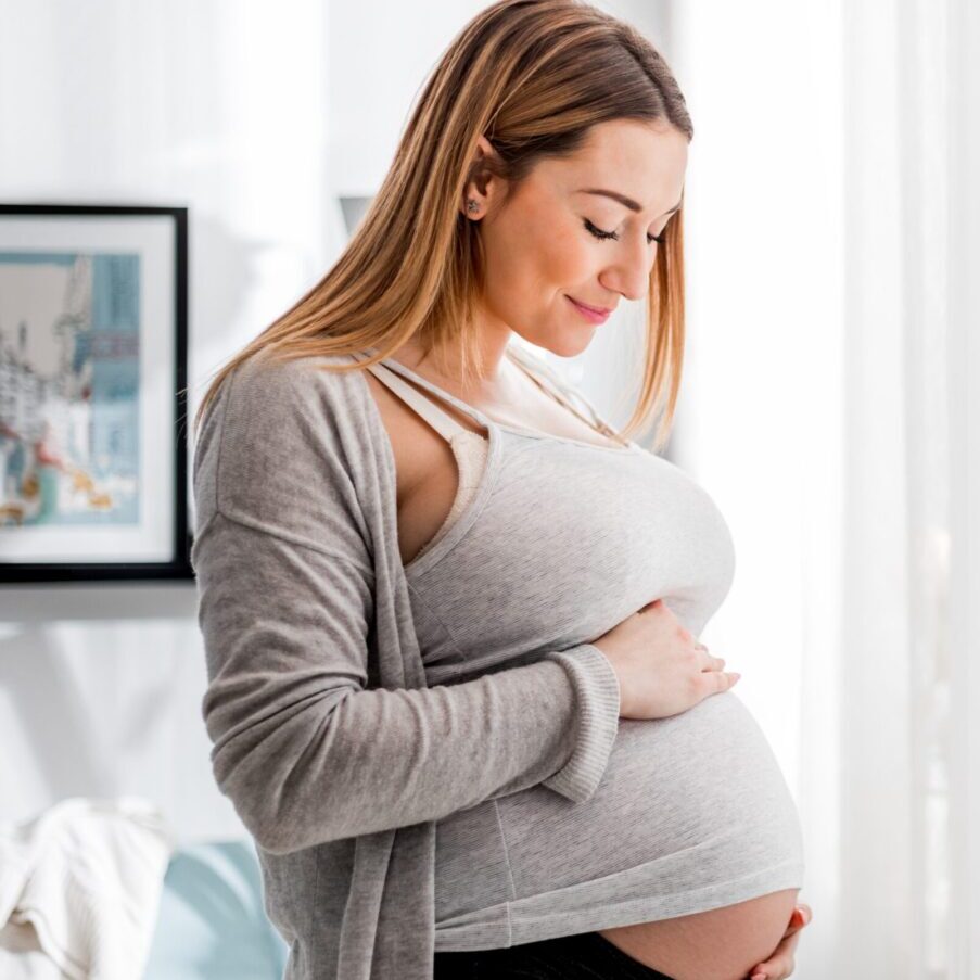 Woman serving as a gestational surrogate