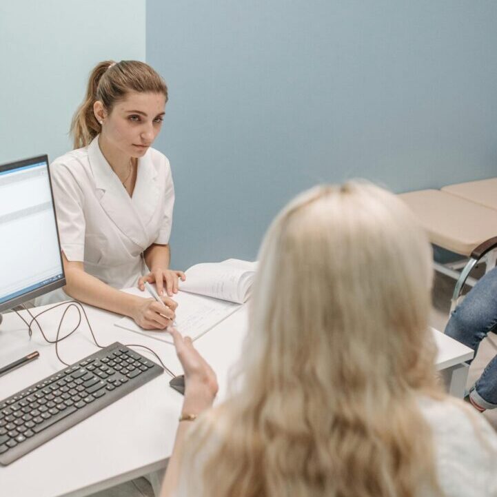 Consultation between patient and specialist showing personalized fertility support