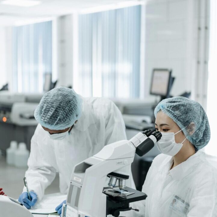 Lab professionals working with advanced fertility technology